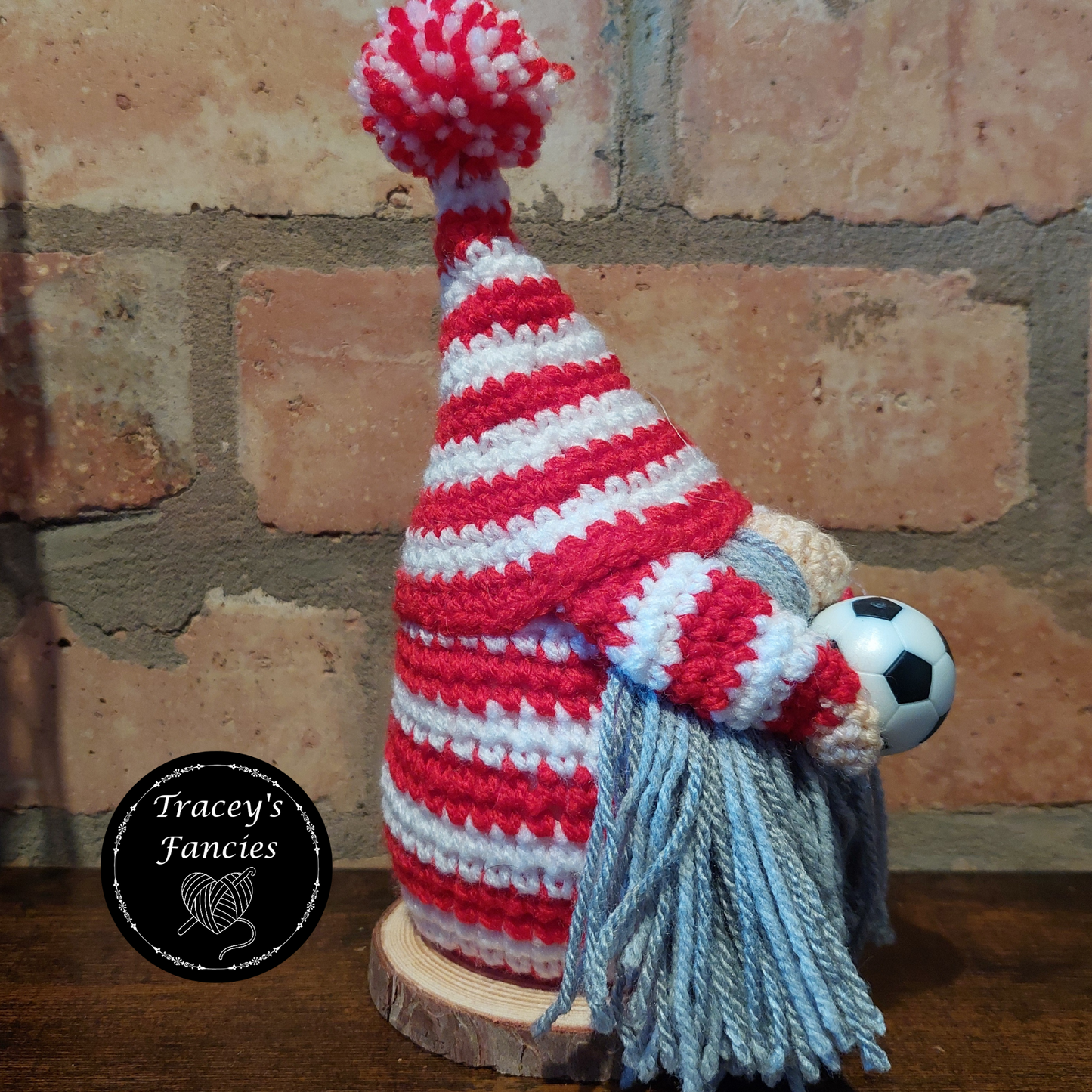 Red and white football gnome shelf sitter collectable