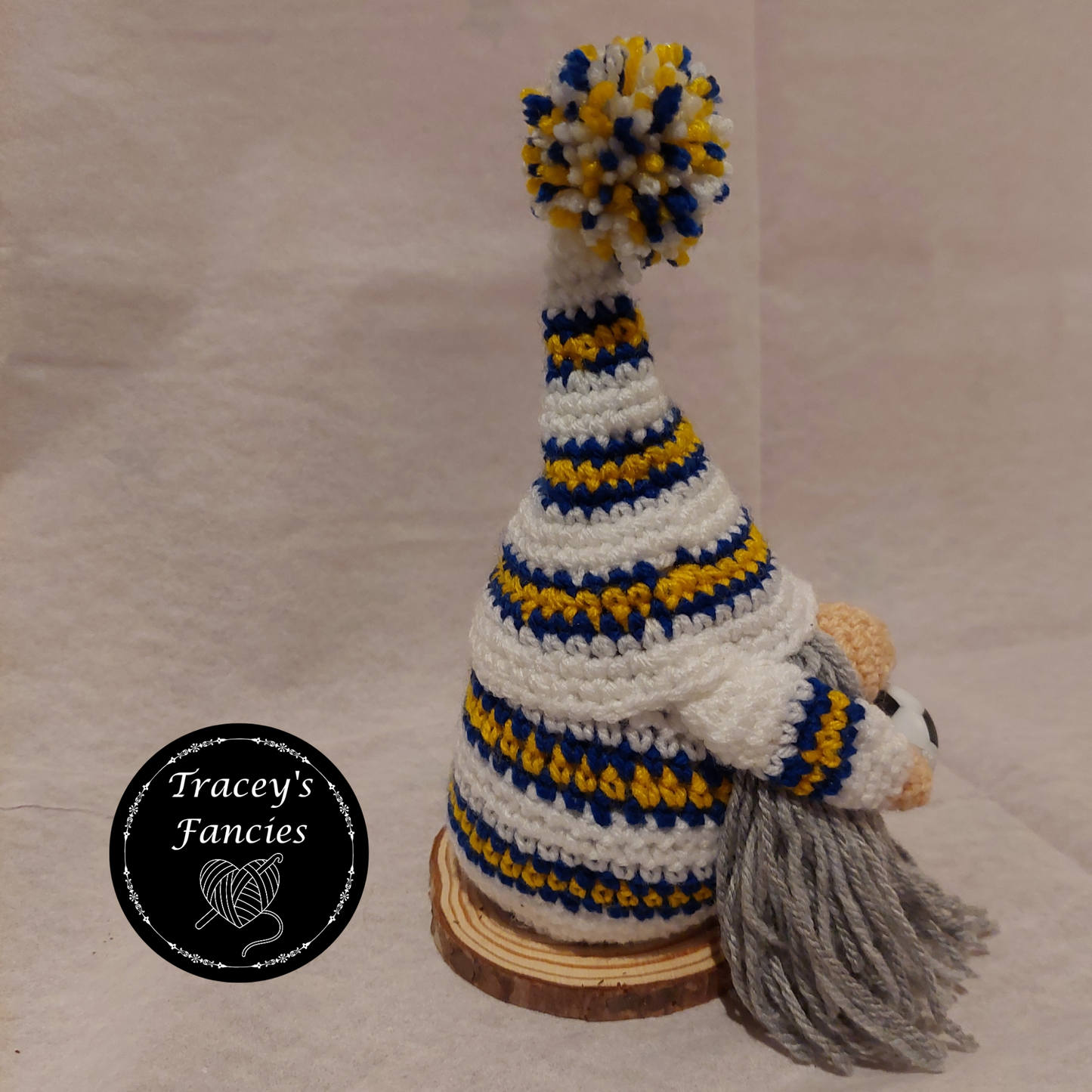White, blue and golden yellow football gnome shelf sitter collectable