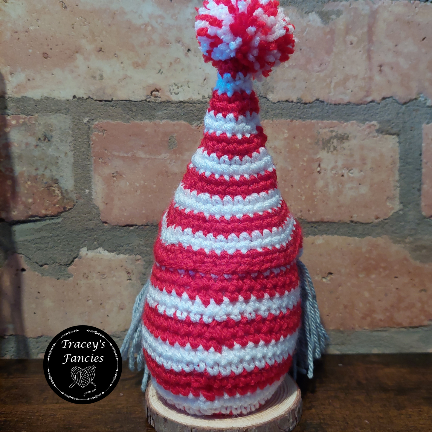 Red and white football gnome shelf sitter collectable