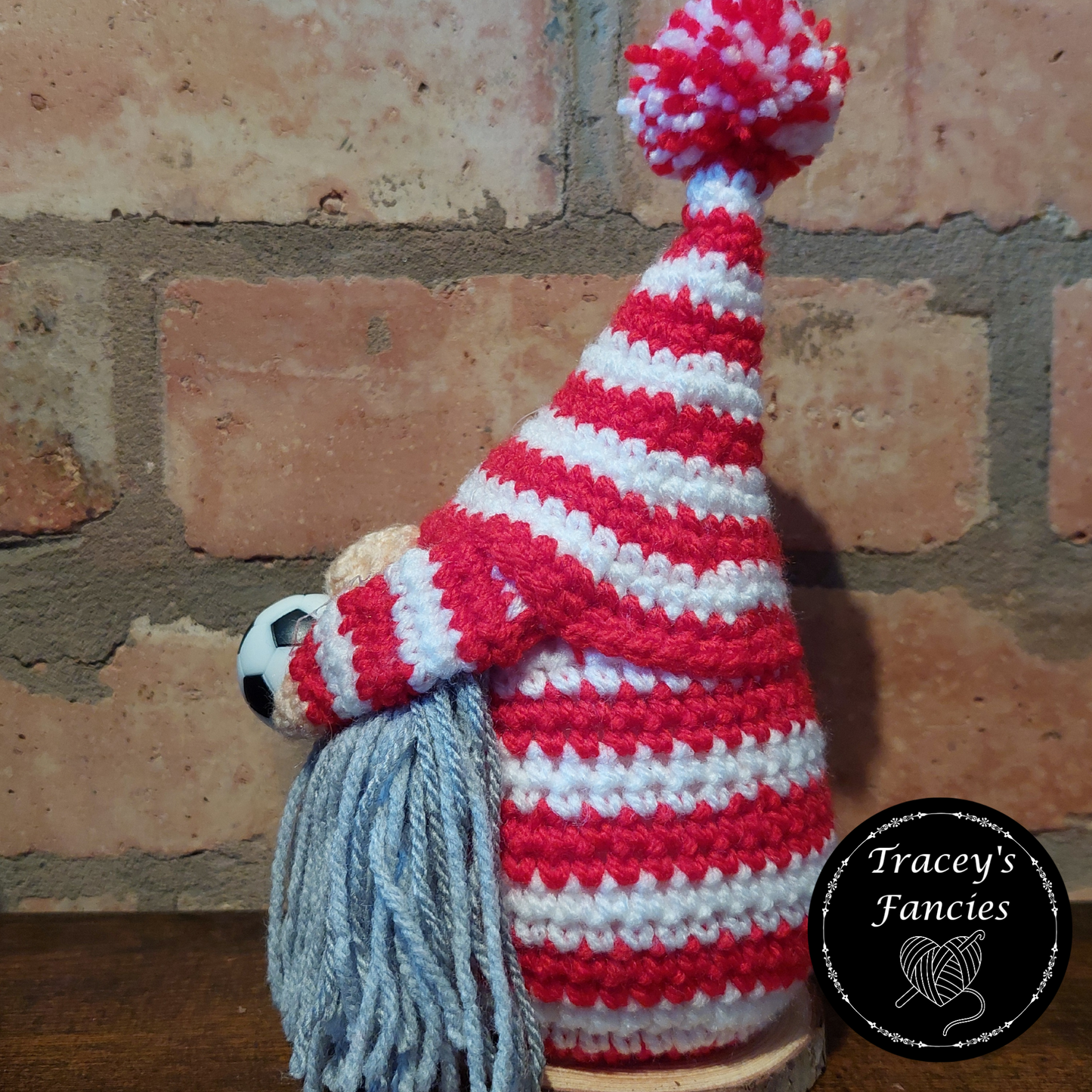 Red and white football gnome shelf sitter collectable