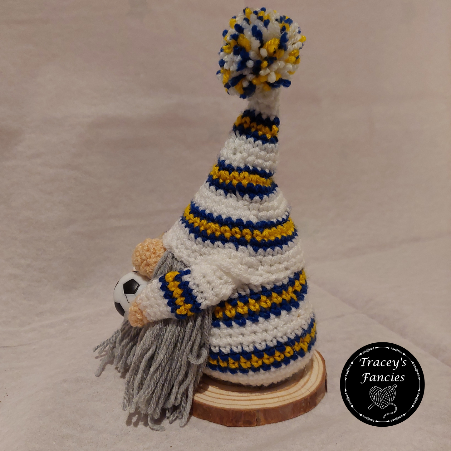 White, blue and golden yellow football gnome shelf sitter collectable